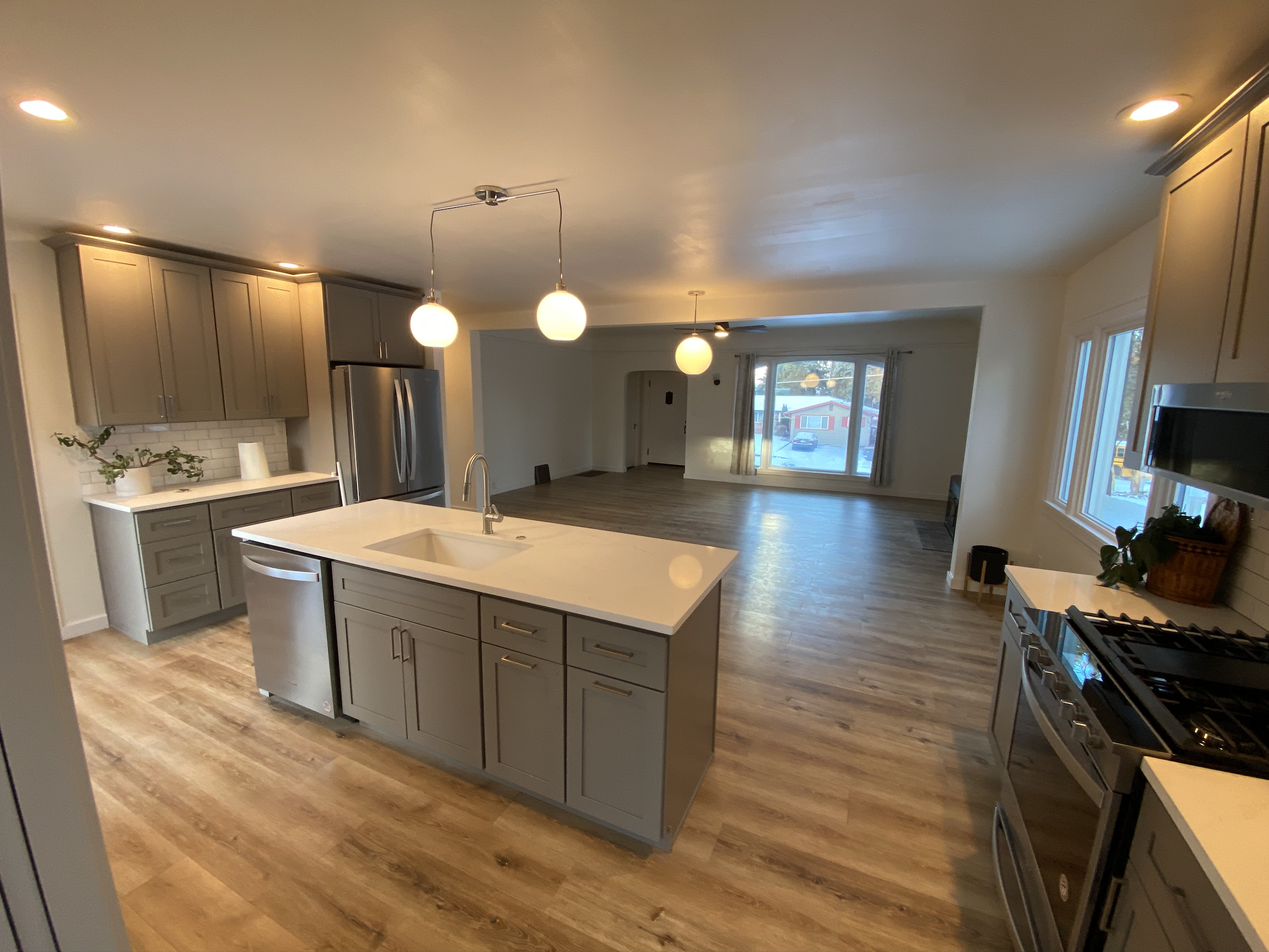 Modern kitchen and living room remodel by Rockin' K General Contracting in Bend, Oregon